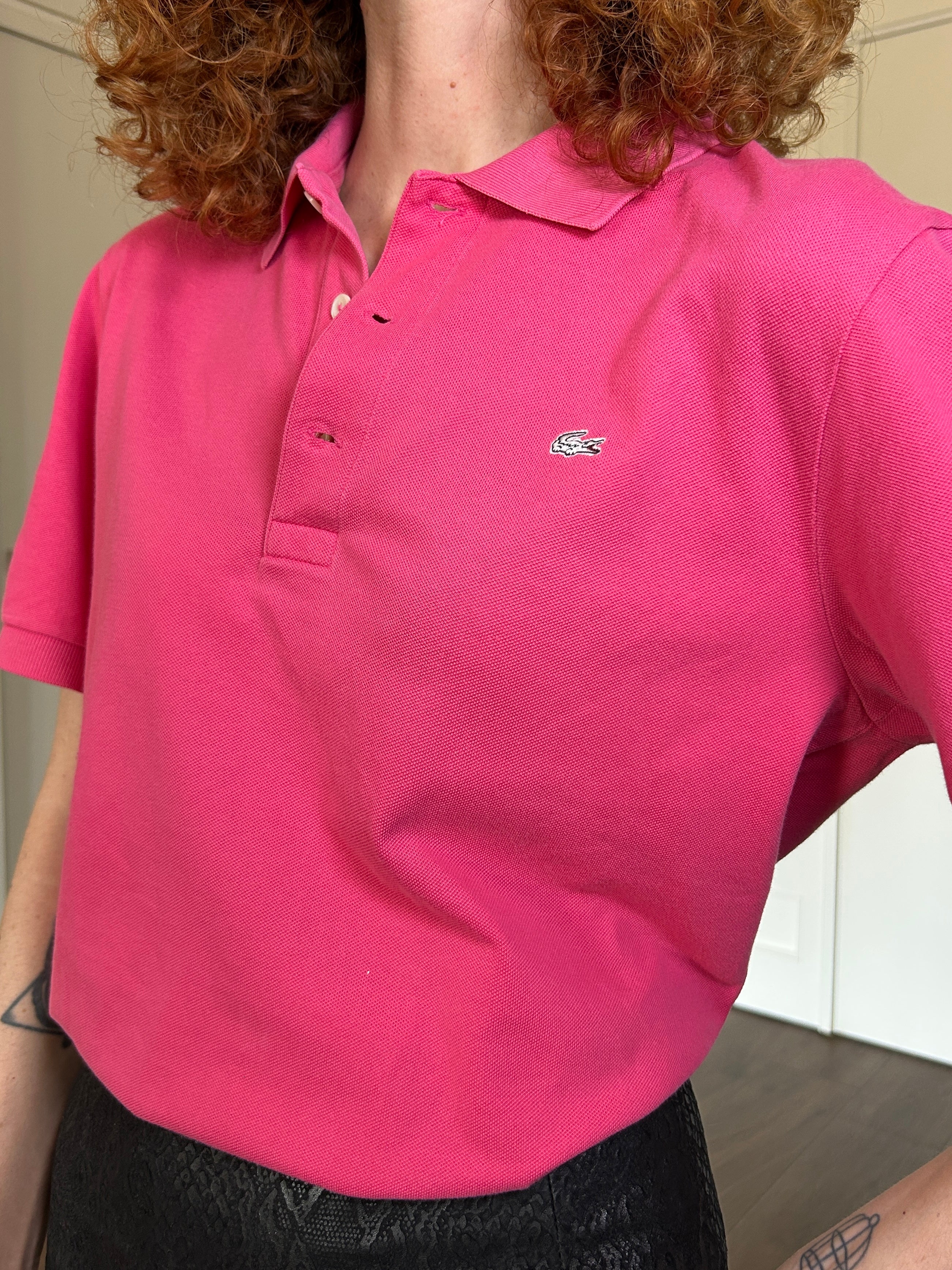 Polo Lacoste fucsia